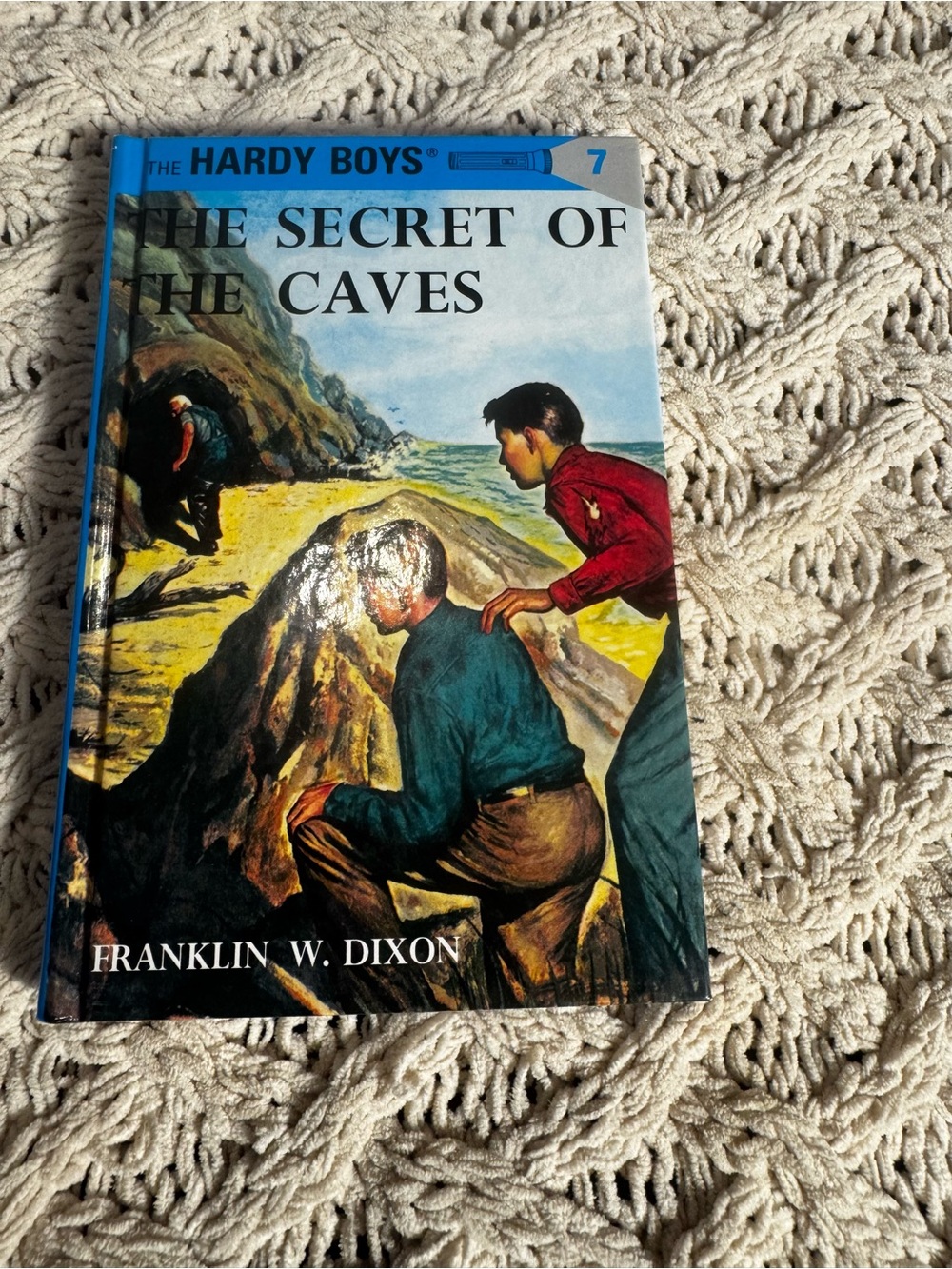 : The Secret of the Caves - Blue Hardcover by Franklin W. Dixon